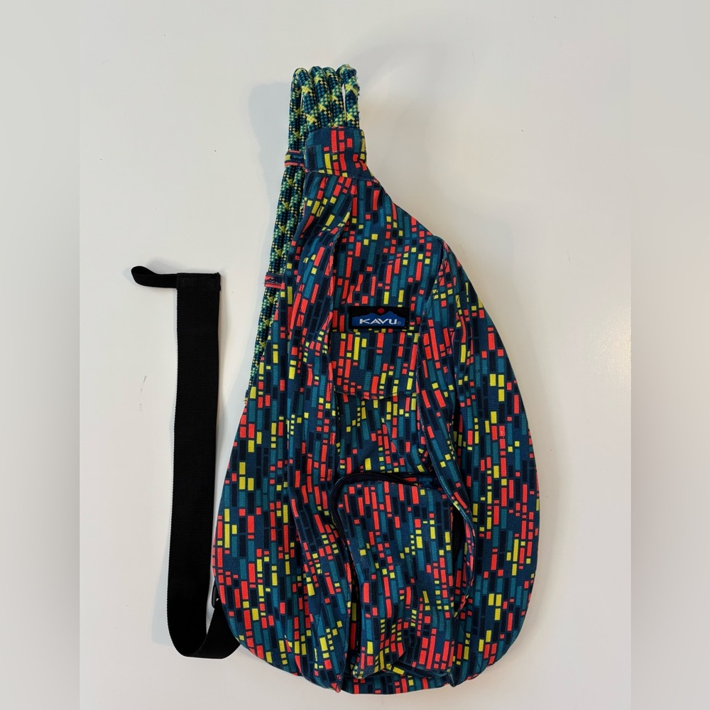 KAVU Geometric Sling Bag in Red, Blues, and Yellow